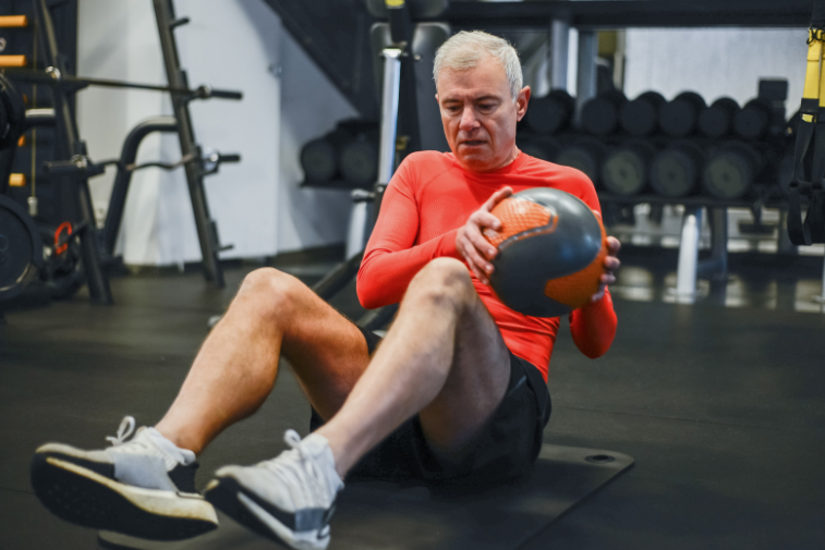 Older man exercising to maintain muscle strength